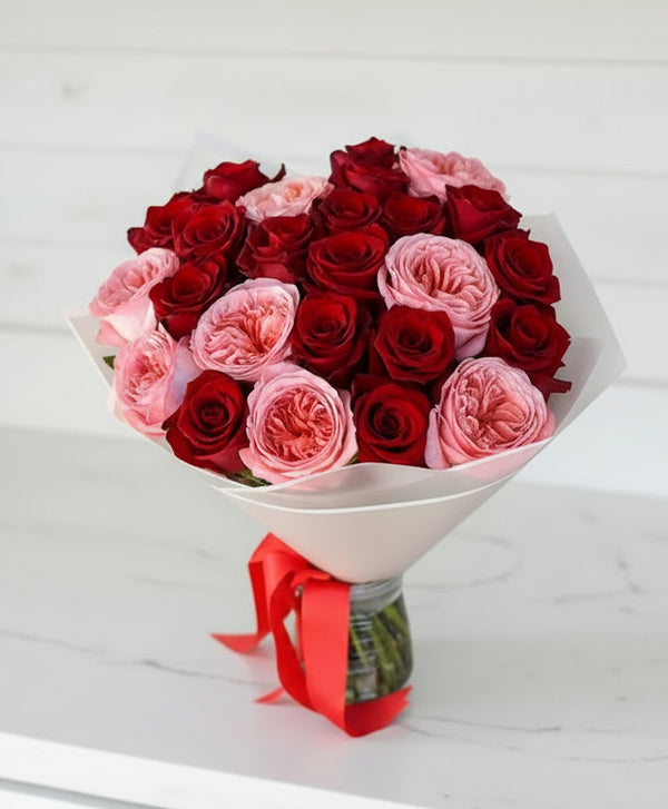 24 red roses and pink roses wrapped bouquet 